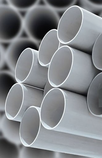 PVC Pipes stacked in warehouse. UPVC Pipe